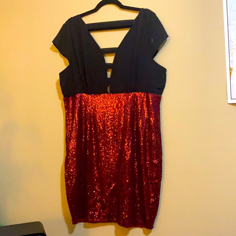 Gorgeous red sequin and black dress.